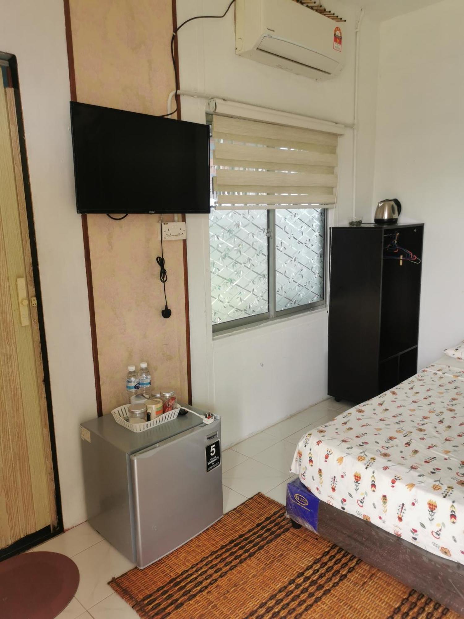 Merdeka Guest House 2 Кучинг Экстерьер фото