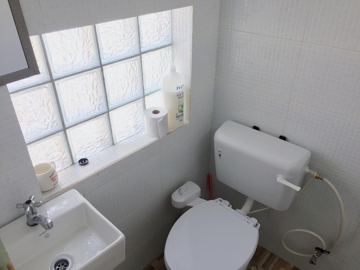 Merdeka Guest House 2 Кучинг Экстерьер фото